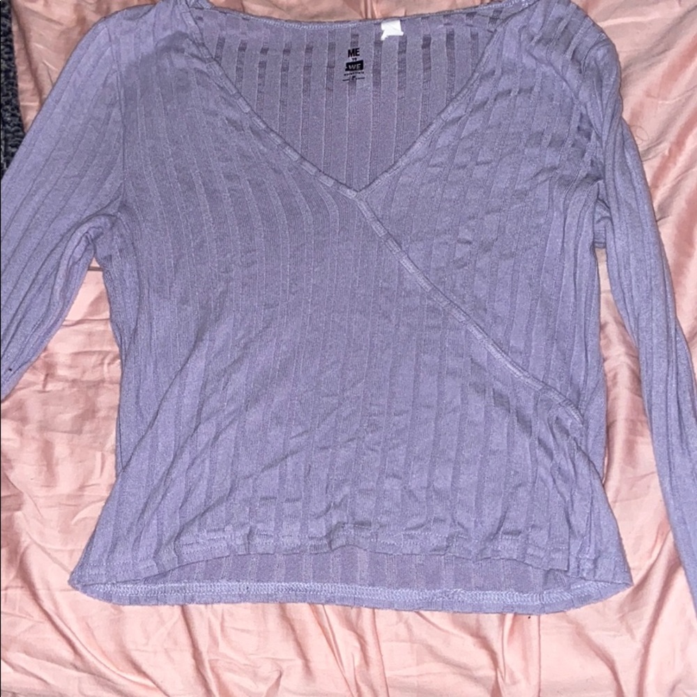 A cropped long sleeve shirt